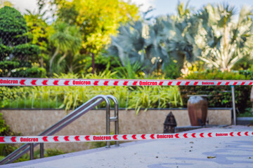 Omicron variant of COVID. New strain of coronavirus. Corona Virus threat closes beaches and public places in many countries. NOT ALLOWED AREA