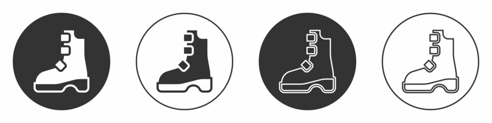 Black Ancient viking boots icon isolated on white background. Traditional clothes and accessories of past times. Circle button. Vector