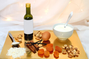 Ingredients for a peach and pistachio cake. Festive holiday background. Selective focus.
