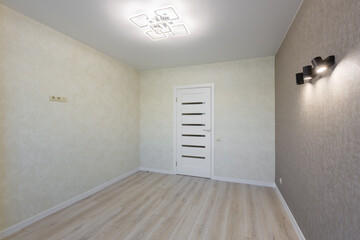 Small room after renovation, and unfurnished, interior with a large window
