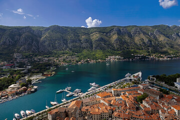 Boka Kotor bay with old house roofs, mountains, sky - 471867641