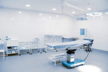 Empty interior operating room and modern equipment in hospital. Medical device for surgeon surgical...