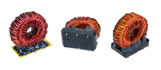 Closeup of various electronic toroidal coils isolated on white panoramic background. Set of red...