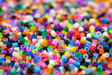Fototapeta na wymiar Multicolored plastic beads toy for kids . Full frame backgraunds image.