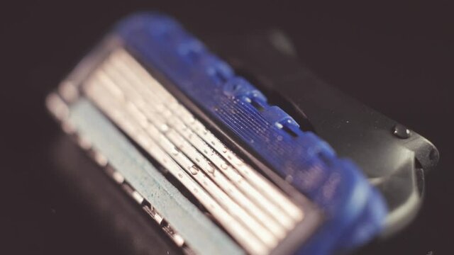 Modern shiny cassette for men's razor in close-up