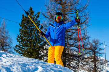Alpine skier with T-bar lift