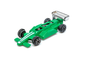 Fototapeta premium Photo of green toy model car isolated on white background