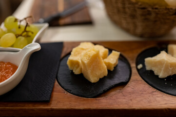 Tasting of different matured and old parmesan Parmigiano-Reggiano hard cheese in Parma, Emilia Romagna, Italy