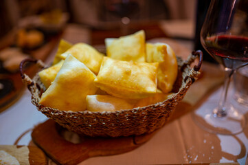 Food of Emilia Romagna region, deep fried bread gnocco fritto or crescentina served in restaurant...