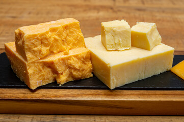 British cheeses collection, Scottish coloured and English matured cheddar cheeses
