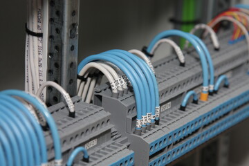 The electrical terminals are connected by a mounting wire in the electrical panel.