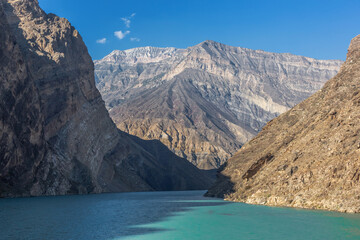 The confluence of the Avar koysu and the Andi koysu into the Sulak river. Turquoise water of the Sulak river among the rocks. Panoramic mountain view in Dagestan, Russia