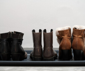 Women's shoes in the hallway.