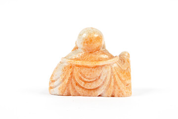 Kleine Buddha Statue sieht in die Ferne und wartet auf Erleuchtung