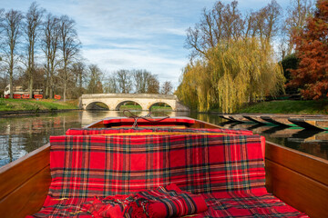 A private punting tour along Cambridge Backs on the River Cam in the city of Cambridge, UK....