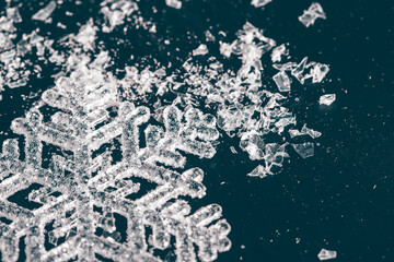 Magic blue holidaybackground with blinking snowflake