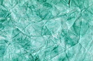 watercolor of delicate white-green emerald color with a textured background. crumpled paper.