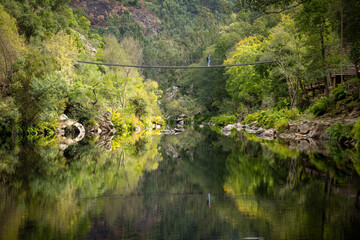 a walkway pedestrian bridge over Paiva river at Arouca Geopark, Municipality of Arouca, Aveiro District, Portugal