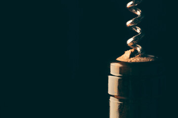corkscrew opens a bottle of wine, close-up, accessory