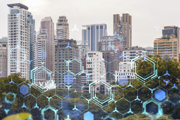 Technology hologram over panorama city view of Bangkok. The largest tech hub in Southeast Asia. The...
