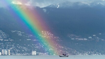 Naklejka na ściany i meble Photo of a rainbow on a boat