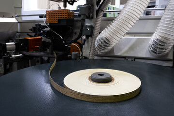 Machine tools for gluing edging onto furniture wood board