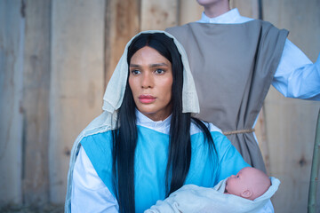 Transgender person representing the virgin mary in a Bethlehem