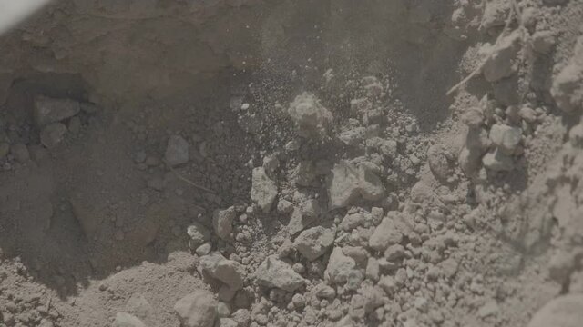 Farmers dig the earth with a shovel and crowbar. Fertile soil. Hand labor, agriculture, cultivation, recultivation, tillage concept. Slow Motion 100 fps 