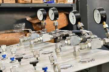 High pressure gauges on the control panel of the hydraulic oil station.