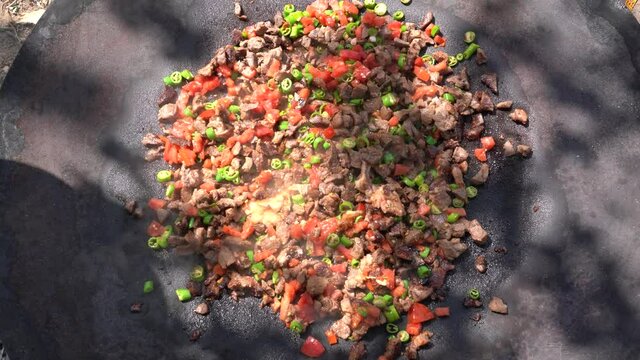 Top view of preparing delicious sac kavurma (a kind of Turkish kebab).   