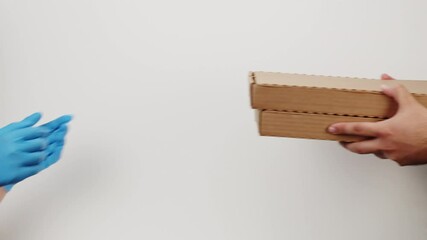 Square cardboard boxes on white background. Preparing take away meals. Online contactless food shopping. Food delivery service. Courier giving order, delivering to customer. 