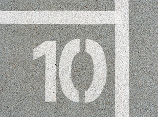 Number ten painted on soft rubber surface. The tenth place,