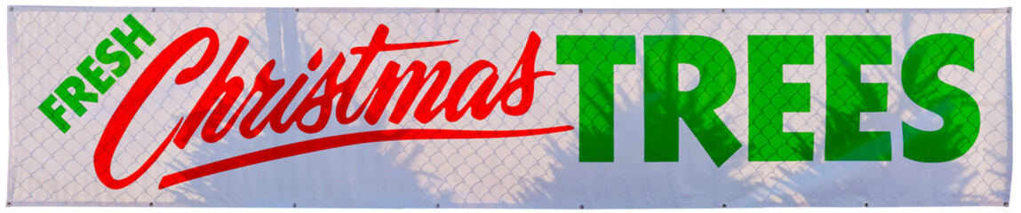 FRESH CHRISTMAS TREES banner sign.