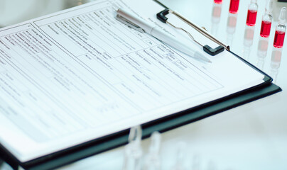 scientist with a digital tablet analyzing new data .