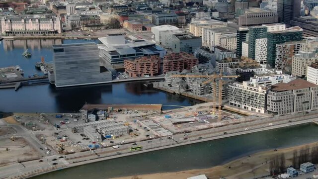 Aerial drone shot of central part of Oslo (Bjorvika, Barcode and Munch museum) in summer 2020