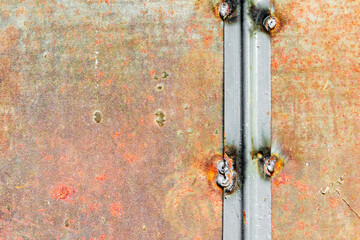 Metal texture with scratches and cracks which can be used as a background