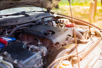 Open hood of a car with a diesel engine. Repair and maintenance of transport.