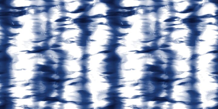 Seamless indigo tie dye 1970s funky hippie repeat pattern swatch motif for surface design and print. High quality illustration. Vibrant navy blue apparel material print. Psychedelic textile design.