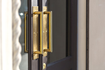 Door handle at the entrance to the restaurant, gold