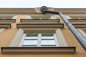 Old house with a new facade and gutter