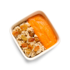 Bowl of tasty oatmeal with pumpkin and raisin on white background