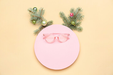 Blank card, Christmas decor and eyeglasses on color background