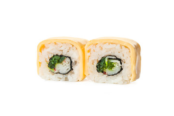 Two pieces of Japanese sushi roll with egg omelet on top seaweed and crab meat stick inside roll....