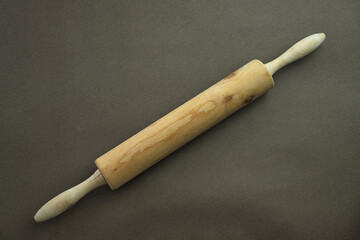 Wooden roller. Wooden kitchen utensil
