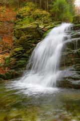 Fototapeta na wymiar Waterfall in Obidza, late autumn, Beskid Sadecki mountain range in Carpathian Mountains, Poland.