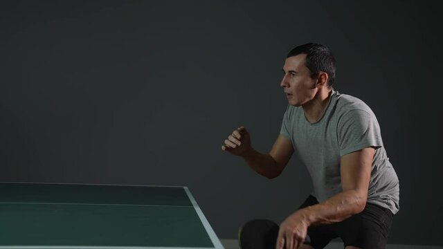 table tennis. man a athlete playing ping pong. sport party tournament concept. sportsman man training playing lifestyle table tennis. forehand and backhand exercise in ping pong