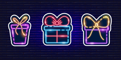Gift box neon stickers set. Glowing holiday gift icon. New Year and Christmas concept. Vector illustration for design.