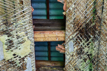 Rough surface of old retro wood ceiling slabs. The ruin of an abandoned house. Textured background....