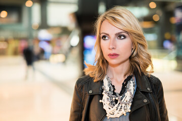 Fototapeta premium Woman walking in a public place