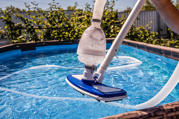 Swimming pool vacuum cleaner. Cleaning equipment for small pools
